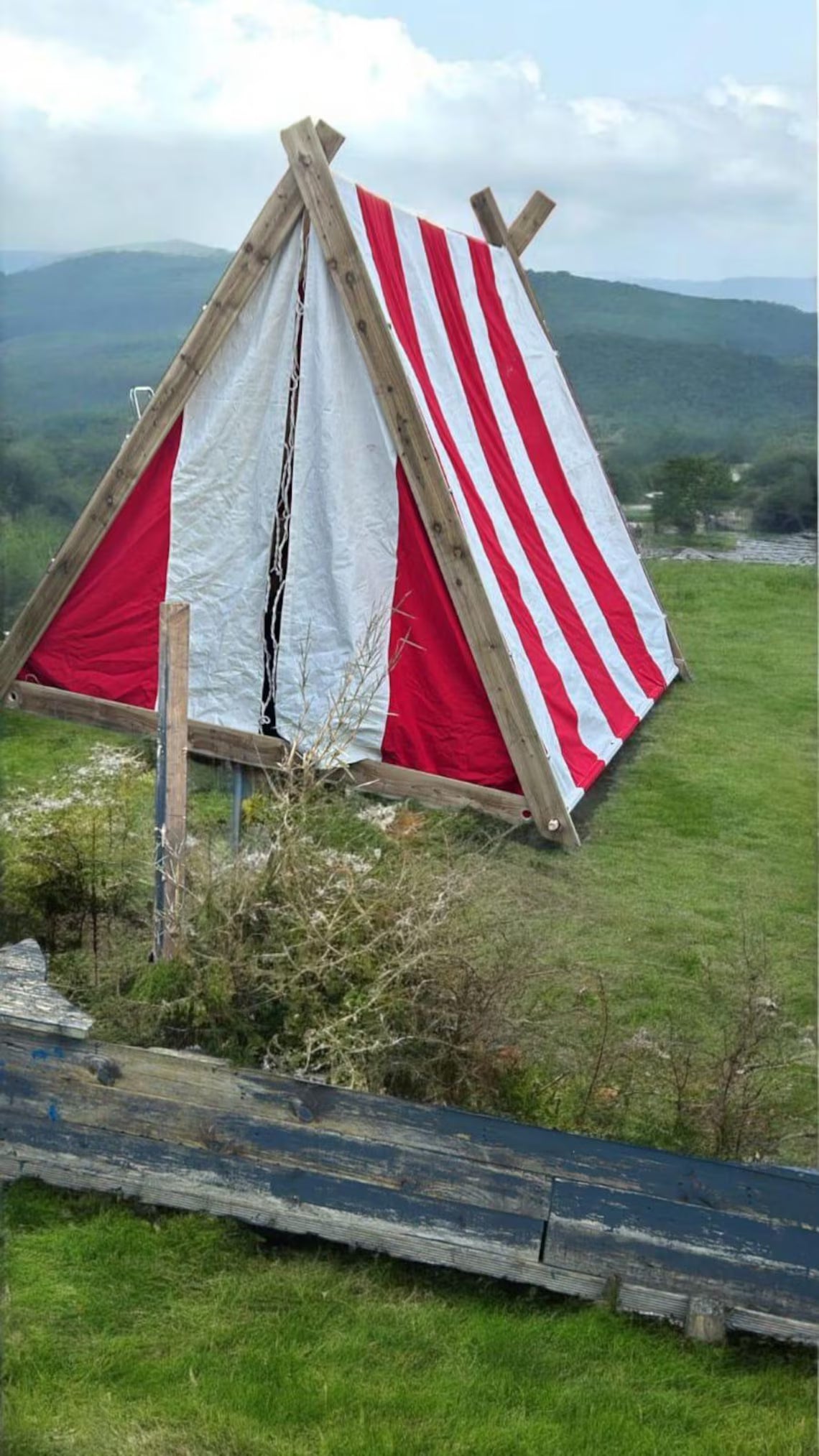 A frame Oseberg tent with red and white stripes